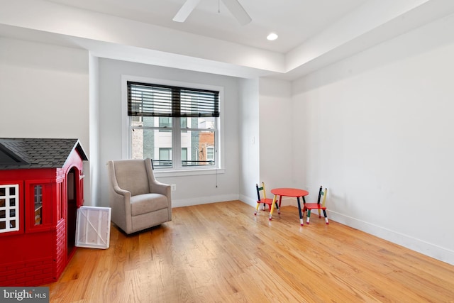 playroom with wood finished floors, baseboards, ceiling fan, and recessed lighting