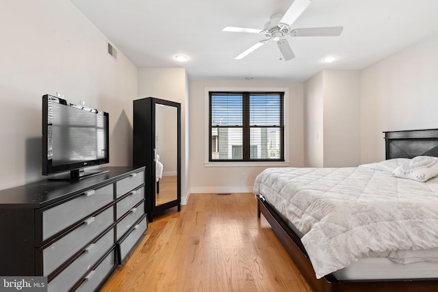 bedroom featuring recessed lighting, baseboards, light wood finished floors, visible vents, and ceiling fan