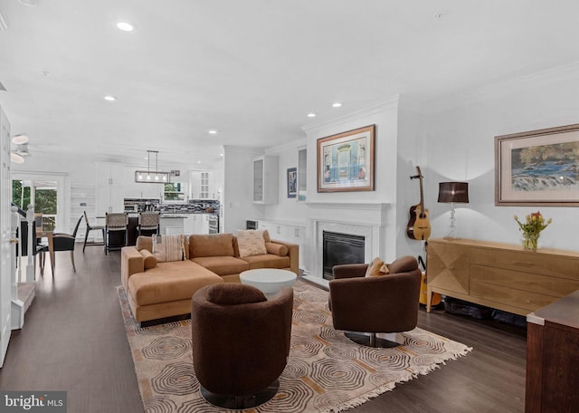 760 Whitetail Cir, King Of Prussia, PA 19406 - living room with dark wood-style flooring, a glass covered fireplace, recessed lighting, crown molding, and a ceiling fan