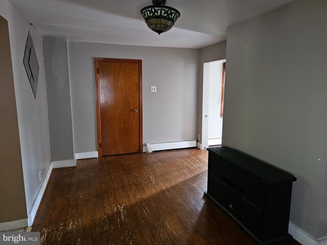 519 Furnace St, Cumberland, MD 21502 - interior space with baseboards, hardwood / wood-style floors, and baseboard heating