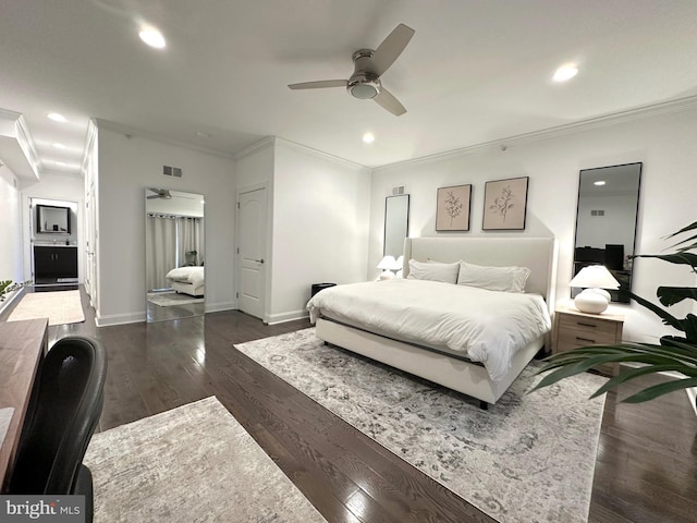 bedroom with dark wood finished floors, crown molding, baseboards, recessed lighting, and a ceiling fan