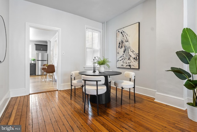 240 W Philadelphia St, York, PA 17403 - dining space with baseboards and hardwood / wood-style floors