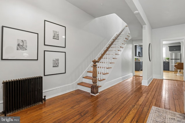240 W Philadelphia St, York, PA 17403 - interior space with stairway, radiator, baseboards, and wood-type flooring