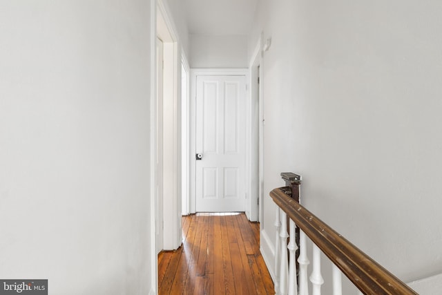 240 W Philadelphia St, York, PA 17403 - hallway featuring wood-type flooring and an upstairs landing
