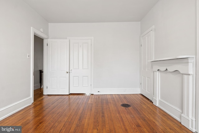 240 W Philadelphia St, York, PA 17403 - unfurnished bedroom featuring hardwood / wood-style flooring and baseboards