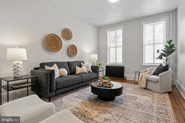 240 W Philadelphia St, York, PA 17403 - living area with radiator, baseboards, and wood-type flooring