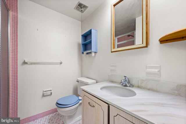 full bath featuring toilet and vanity