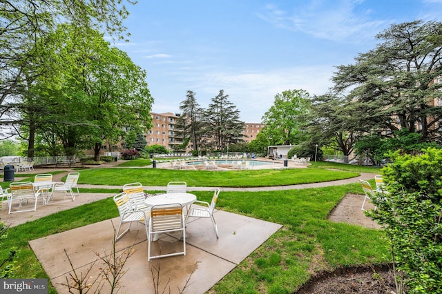 view of patio with a community pool