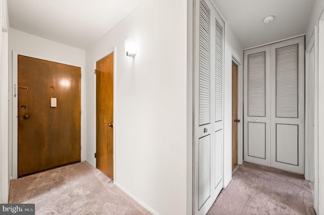 corridor featuring carpet flooring