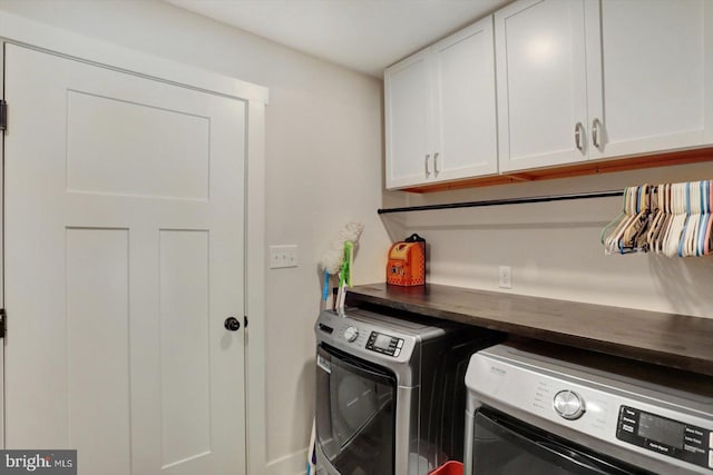 172 Charles St, Hanover, PA 17331 - laundry area featuring cabinet space and separate washer and dryer