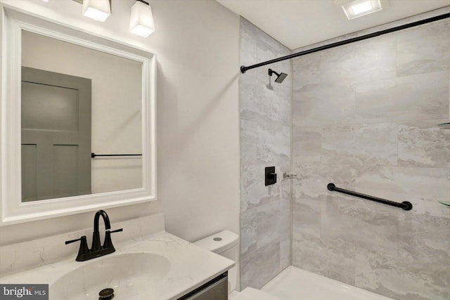 172 Charles St, Hanover, PA 17331 - bathroom with tiled shower, toilet, and vanity