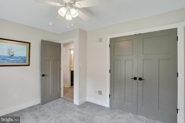 172 Charles St, Hanover, PA 17331 - unfurnished bedroom with baseboards, light colored carpet, ceiling fan, and a closet