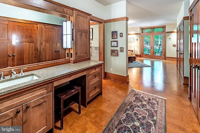 7004 Upper York Rd, New Hope, PA 18938 - bathroom with baseboards, wood finished floors, and vanity