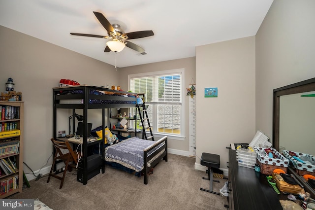 bedroom featuring baseboards, carpet, and ceiling fan