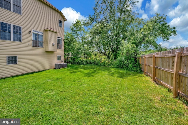 view of yard featuring central AC