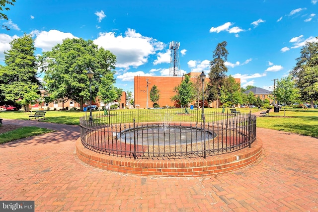 surrounding community featuring a lawn