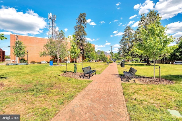 surrounding community with a lawn