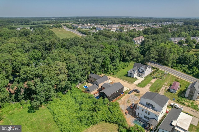 19690 Dunbar St, Rehoboth Beach, DE 19971 - view of property location with a heavily wooded area and nearby suburban area