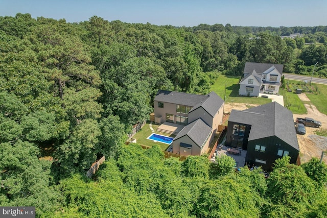 19690 Dunbar St, Rehoboth Beach, DE 19971 - aerial view of property and surrounding area featuring a heavily wooded area