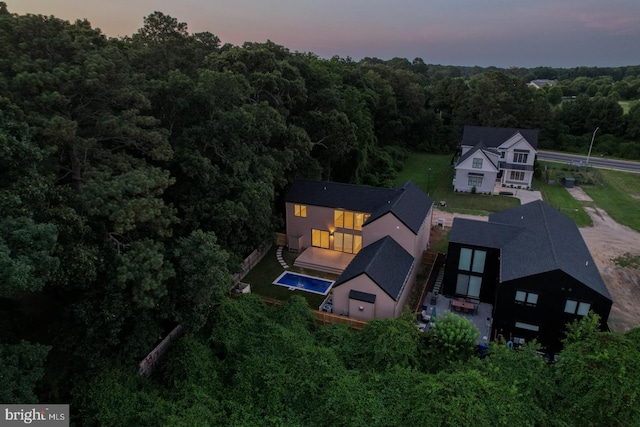 19690 Dunbar St, Rehoboth Beach, DE 19971 - aerial view at dusk of a wooded view