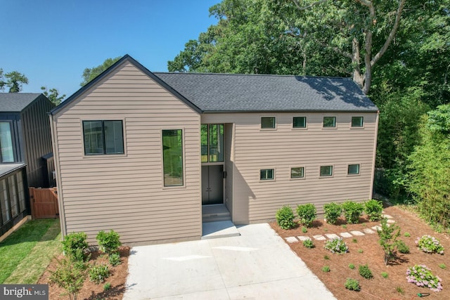 19690 Dunbar St, Rehoboth Beach, DE 19971 - view of front of property with roof with shingles and a patio