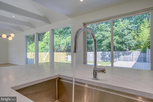 19690 Dunbar St, Rehoboth Beach, DE 19971 - kitchen view of light stone counters and recessed lighting