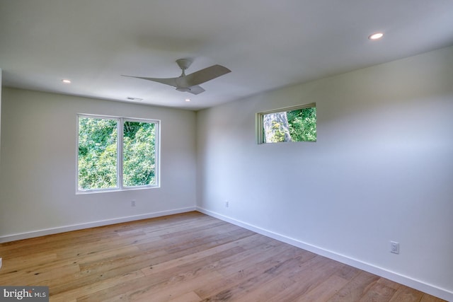 19690 Dunbar St, Rehoboth Beach, DE 19971 - unfurnished room featuring plenty of natural light, ceiling fan, light wood-type flooring, and recessed lighting