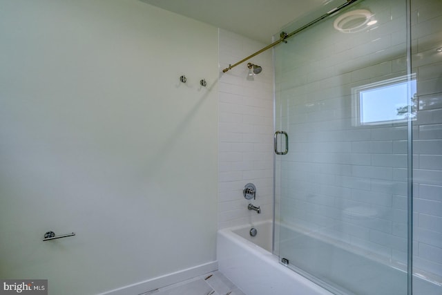 19690 Dunbar St, Rehoboth Beach, DE 19971 - bathroom featuring combined bath / shower with glass door and baseboards