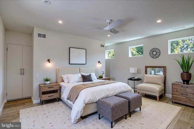 19690 Dunbar St, Rehoboth Beach, DE 19971 - bedroom featuring light wood finished floors, multiple windows, recessed lighting, and a ceiling fan