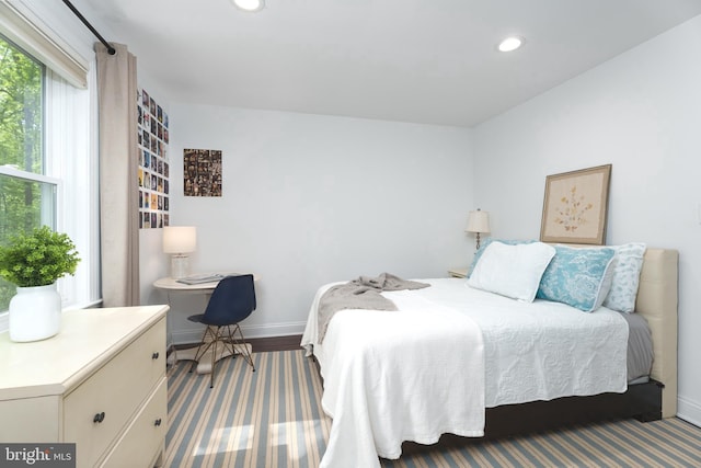 bedroom featuring baseboards and recessed lighting
