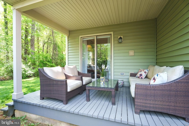 deck featuring outdoor lounge area
