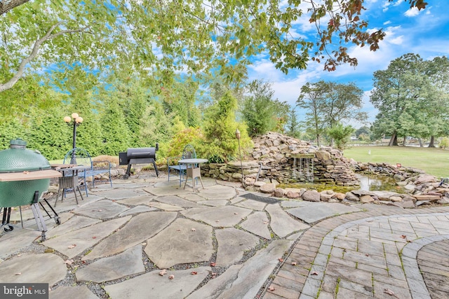view of patio featuring outdoor dining area