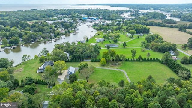 birds eye view of property with a water view and a rural view