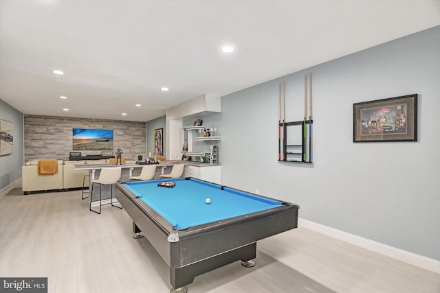 recreation room featuring billiards table, recessed lighting, light wood finished floors, baseboards, and an accent wall