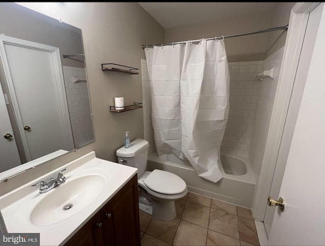 full bath with vanity, tile patterned flooring, shower / tub combo, and toilet