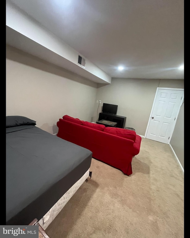 interior space with baseboards and visible vents