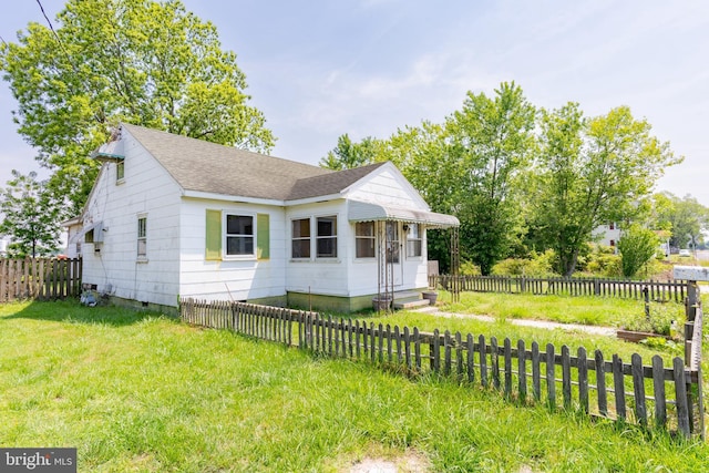 bungalow-style home with crawl space and a shingled roof