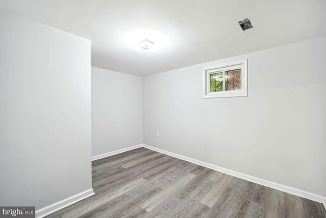 4112 Norcross St, Temple Hills, MD 20748 - spare room featuring baseboards and wood finished floors