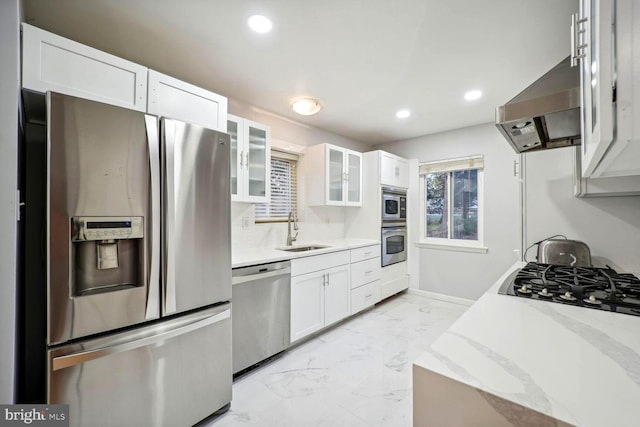 4112 Norcross St, Temple Hills, MD 20748 - kitchen with a sink, stainless steel appliances, white cabinets, marble finish floor, and recessed lighting
