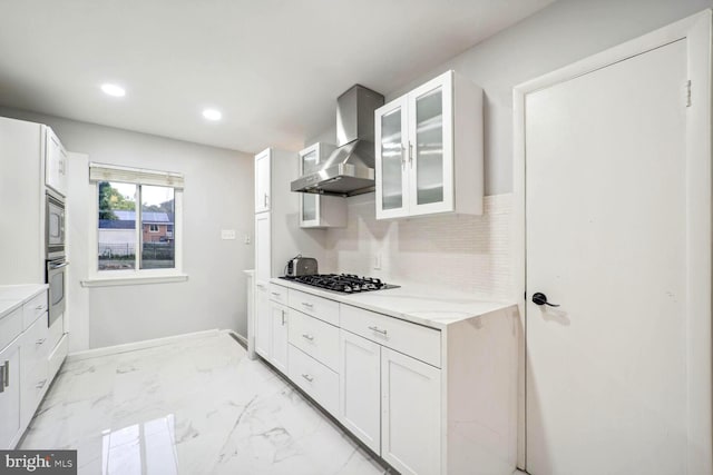 4112 Norcross St, Temple Hills, MD 20748 - kitchen with stainless steel appliances, wall chimney exhaust hood, white cabinetry, decorative backsplash, and glass insert cabinets