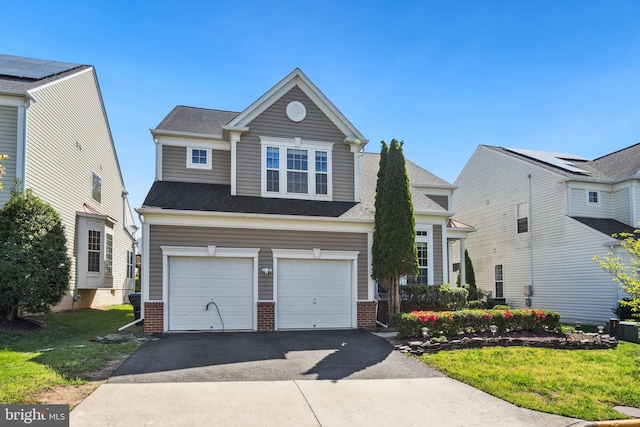 5307 Sammie Kay Ln, Centreville, VA 20120 - traditional-style home featuring an attached garage, aphalt driveway, a front yard, brick siding, and roof with shingles