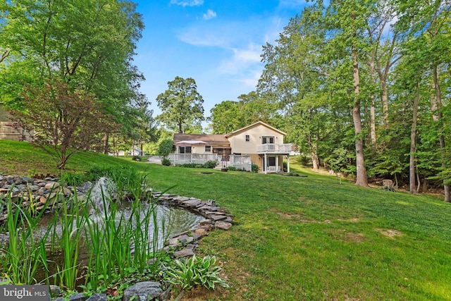 8186 Ebbtide Ln, Lusby, MD 20657 - view of yard with a wooden deck