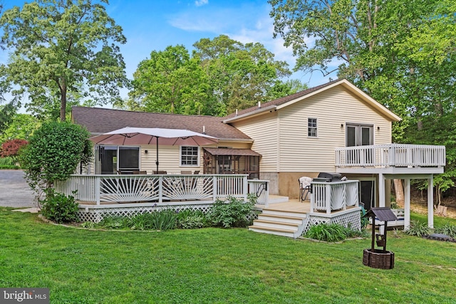 8186 Ebbtide Ln, Lusby, MD 20657 - back of property with a lawn, a wooden deck, and roof with shingles