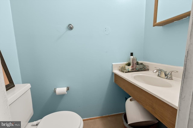 half bath with a sink and toilet