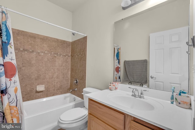 full bath featuring toilet, vanity, and shower / bathtub combination with curtain