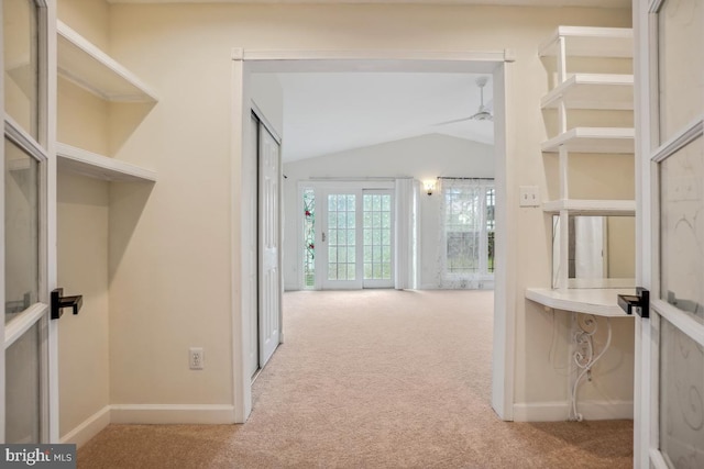 905 Burke Dr, Woodbridge, VA 22191 - hallway with vaulted ceiling, carpet floors, and baseboards