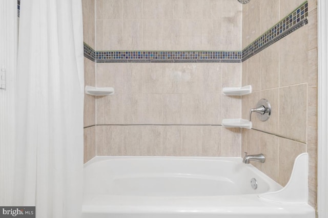 905 Burke Dr, Woodbridge, VA 22191 - bathroom featuring shower / bath combo with shower curtain