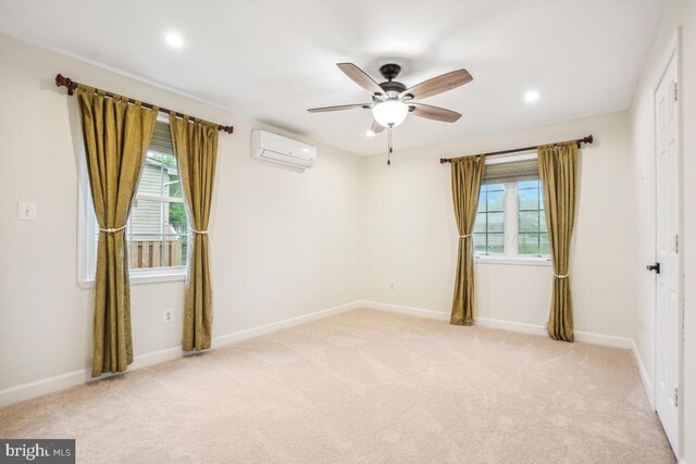 905 Burke Dr, Woodbridge, VA 22191 - spare room with a wall mounted air conditioner, light colored carpet, ceiling fan, baseboards, and recessed lighting