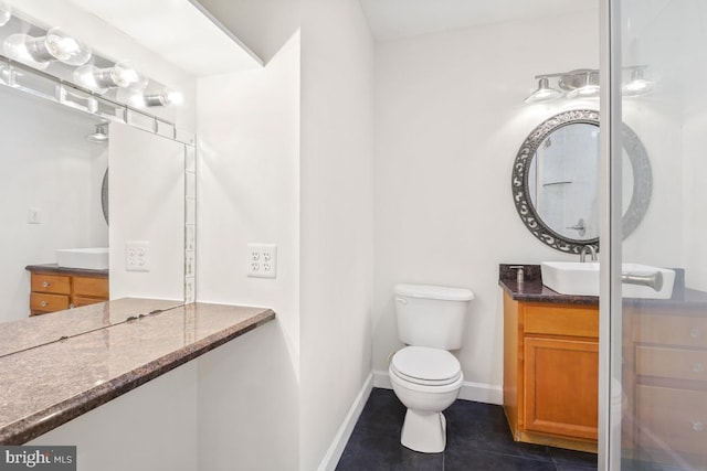905 Burke Dr, Woodbridge, VA 22191 - bathroom with vanity, tile patterned floors, toilet, and baseboards