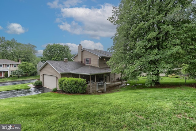 view of property exterior with a chimney, asphalt driveway, and a garage